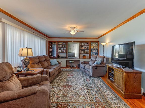 Refinished hardwood floors, new blinds, new ceiling light/fan. Beautiful rug stays with home.