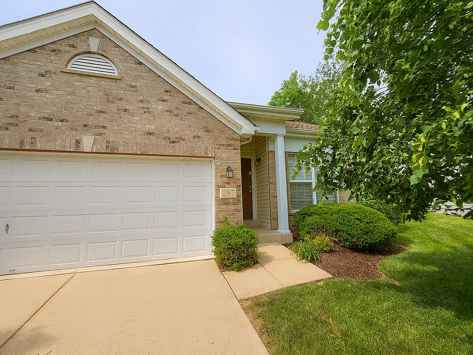 2 car garage. HOA mows the lawn.