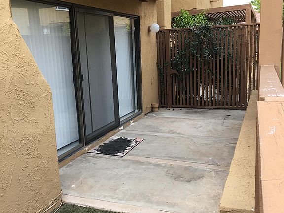 Large patio in unit back with fencing and lockable gate.