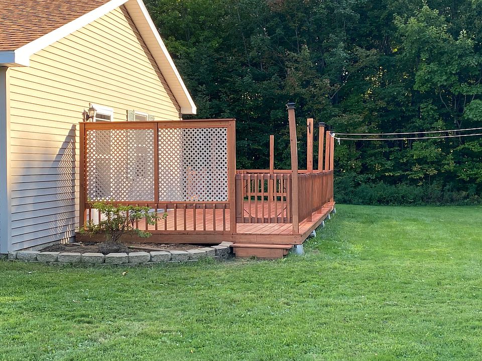 Private deck that has two gates for two access points. Door to deck from living room.
