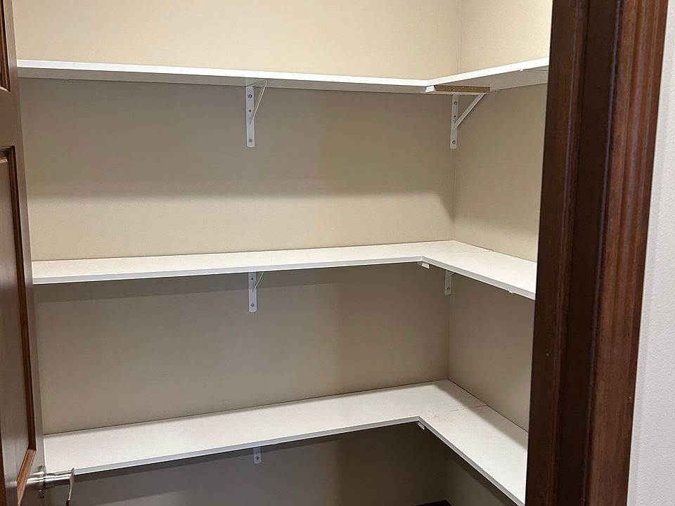Kitchen walk-in pantry.