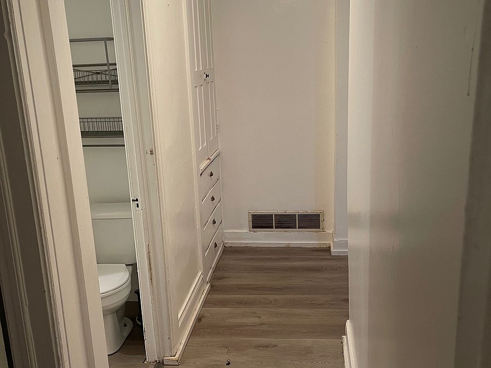 Hall leading to bathroom, bedroom and large walk-in closet