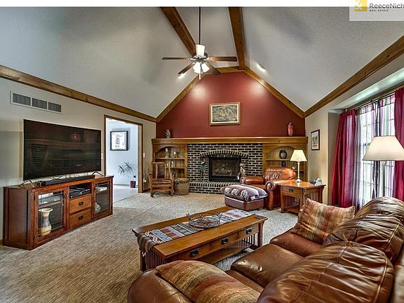 Great room with gas fireplace and custom built-ins