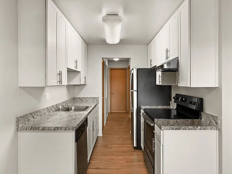Experience the elegance of this modern kitchen, featuring stylish cabinetry and state-of-the-art appliances. Experience the elegance of this modern kitchen, featuring stylish cabinetry and state-of-the-art appliances.