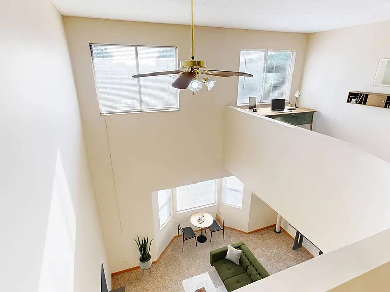A unique loft-style layout opens to soaring ceilings and oversized windows, bringing in natural light and giving your home a bright, open feel.