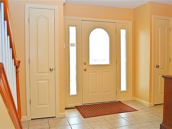 Foyer 7' x 14' - Bright inviting entry with double coat closets.