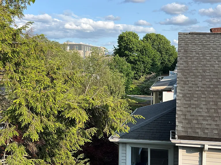 View south from the private deck towards Ball Square and Boston beyond.