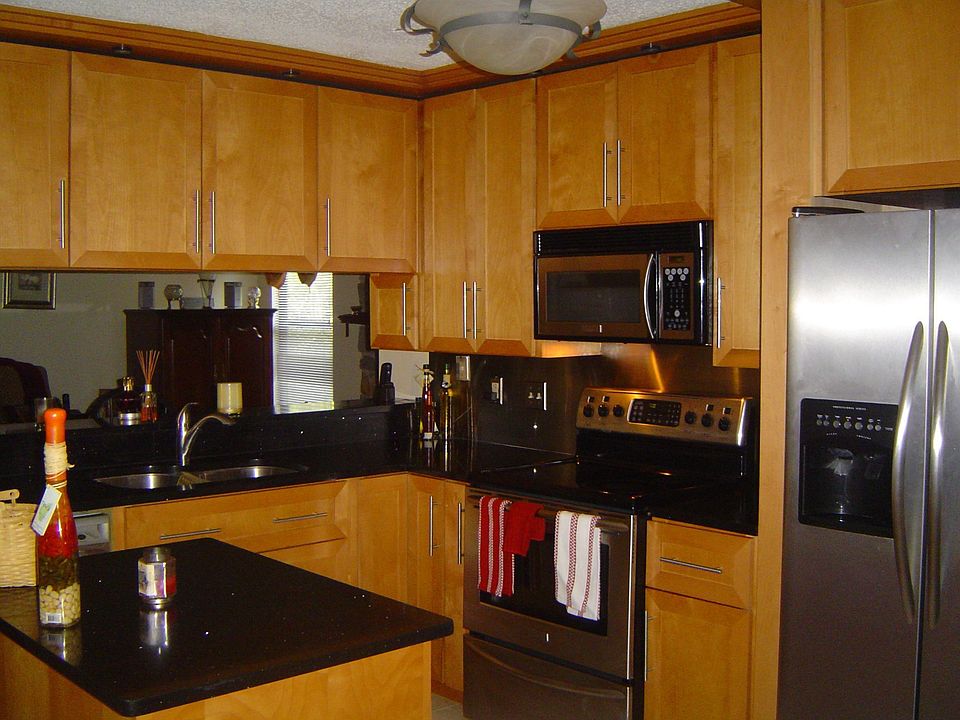 2nd image of 8704 Huntington Woods Cir N