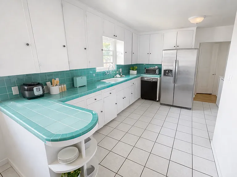 Kitchen w/ Stainless Steel Fridge
