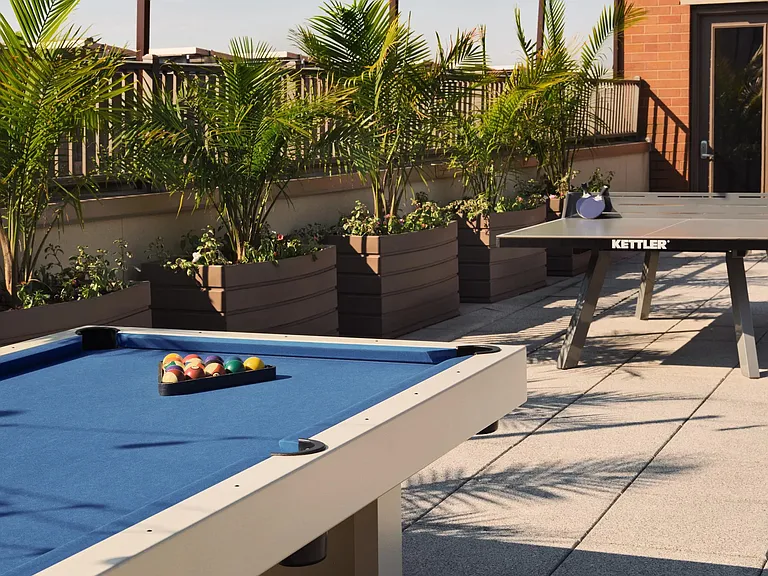 Play a round of billiards on the rooftop terrace.