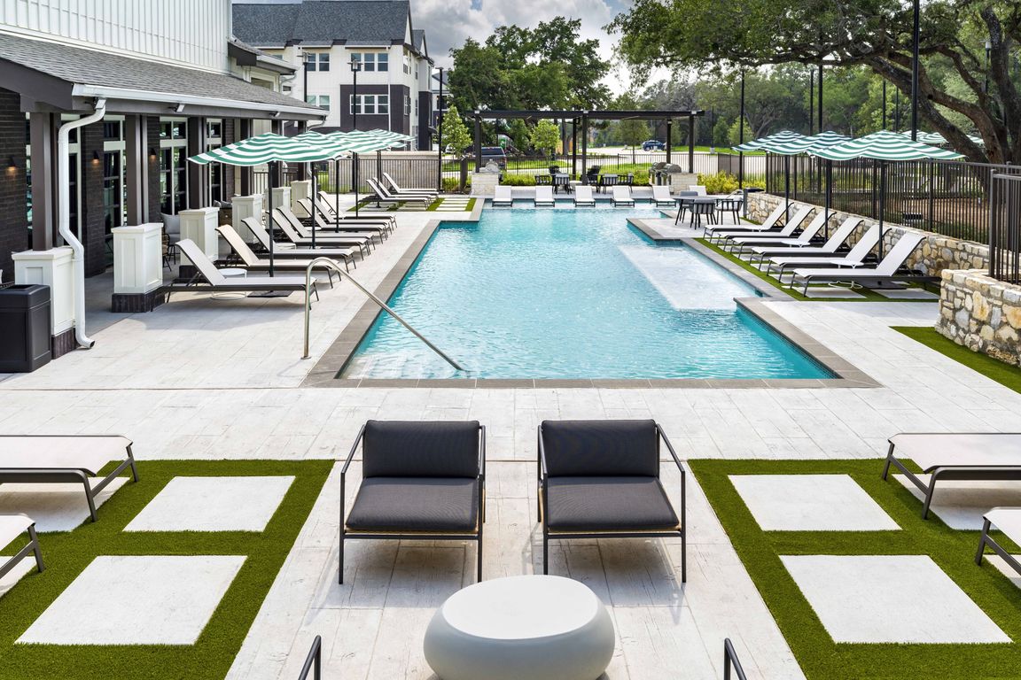 Escape to luxury at Modera Georgetown with our resort-style pool and spacious sundeck, perfect for ultimate relaxation.
