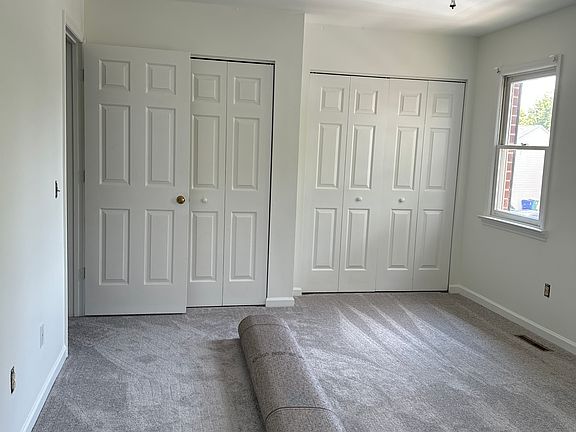 Master bedroom, with bath. NEW carpet, LVP (bathroom) and paint. LOTS of light and TWO closets.