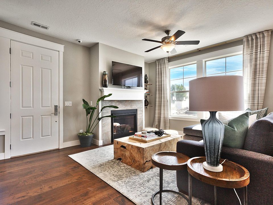 Warm and welcoming living space upon entry on the main floor.