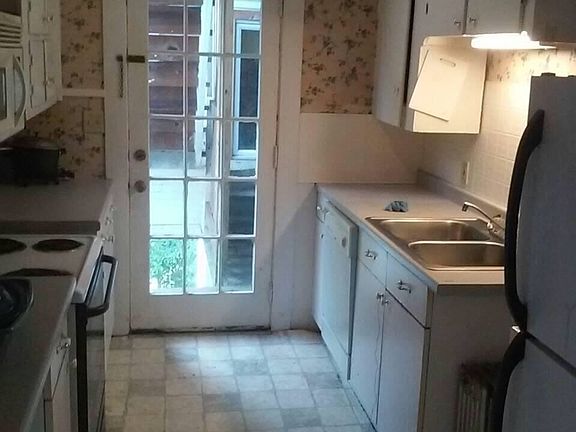 Kitchen entrance off parking