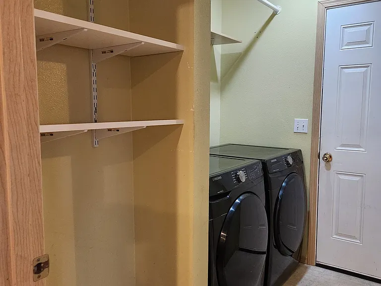 Laundry and door to garage. W/D stay.