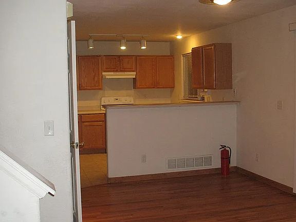 Stairway going up from kitchen