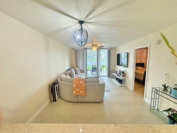 5th image of 9440 Poinciana Place #105