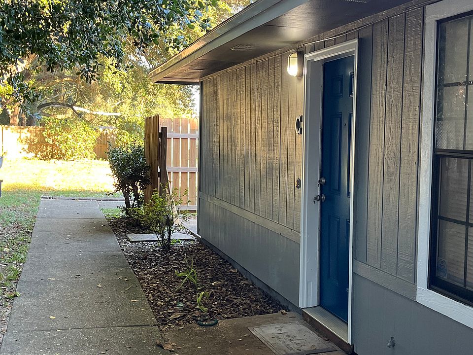 Outside looking east. End unit.