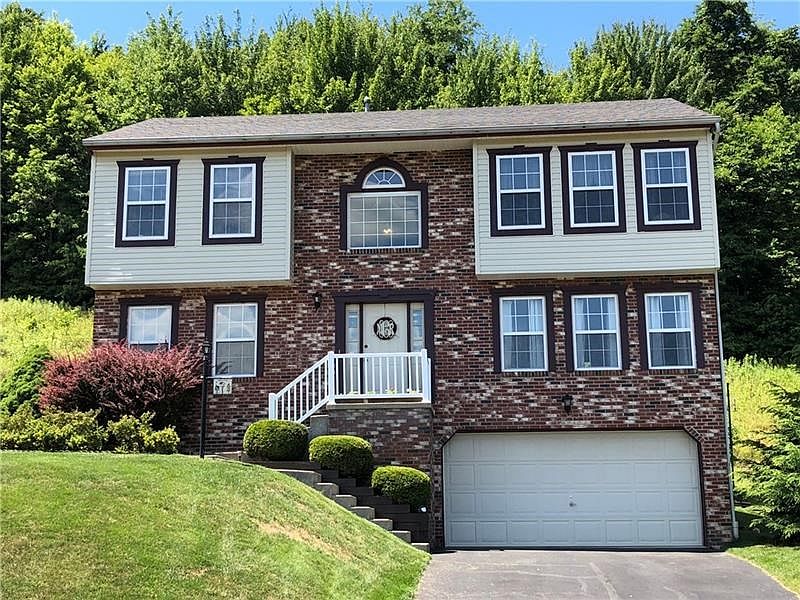 Welcome to 1212 Sandstone Ct. E!! Stunning curb appeal you need to see in person!