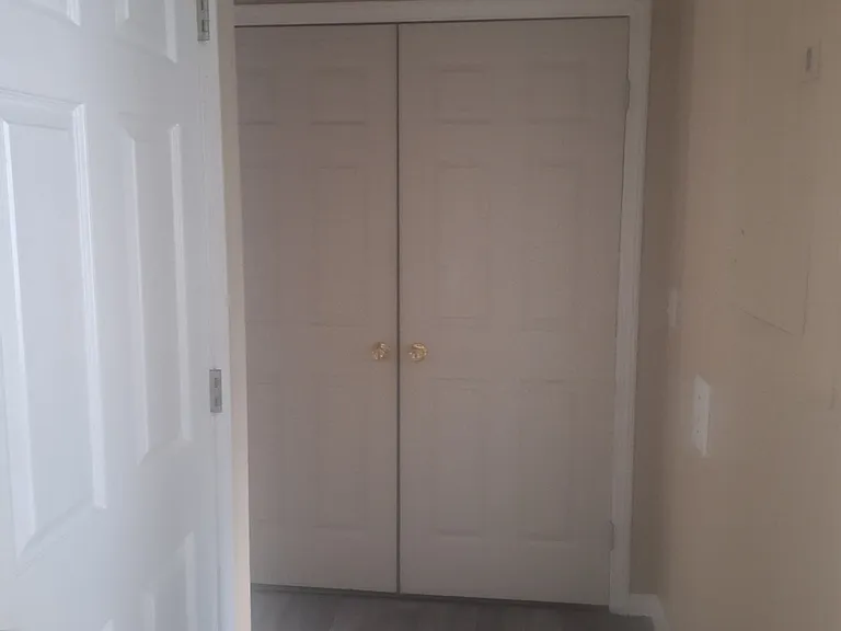 Laundry room off the kitchen hall way