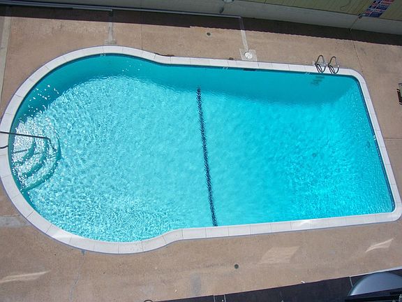 Cool off in the very large Community Pool and BBQ area.