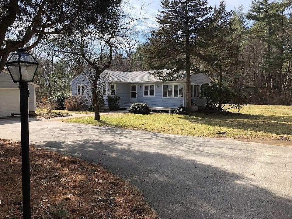 Exterior - Private Setting with 2 car garage.