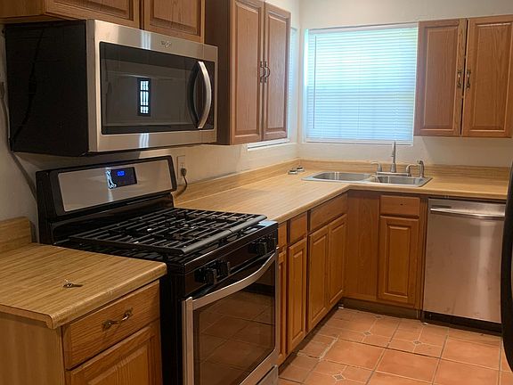 Kitchen with brand new appliances.