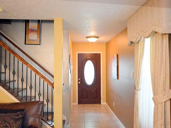 View of the tiled entry & stairway.