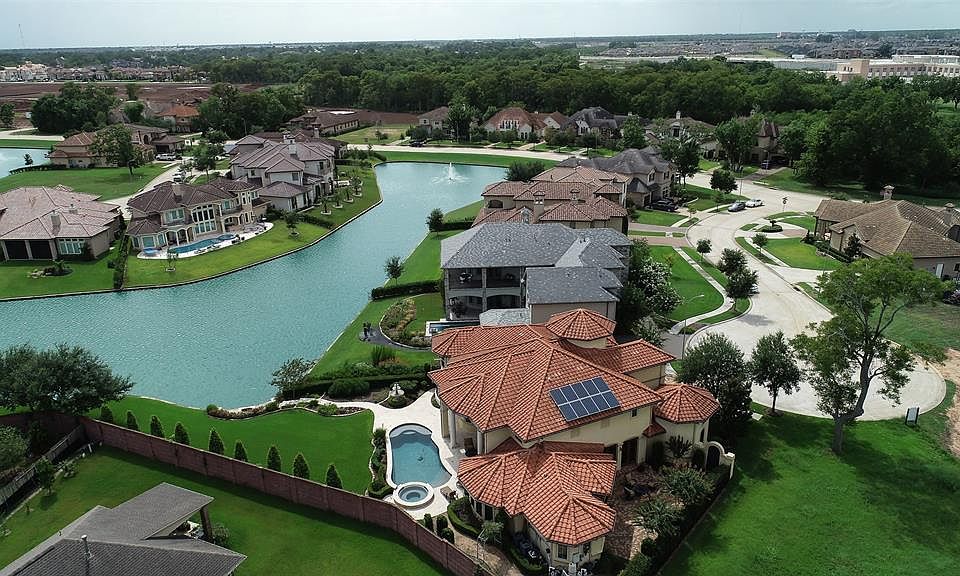 Magnificent Custom Showplace on a Exclusive Home Site with Expansive Waterfront Views.