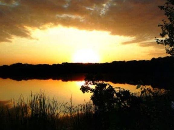 I94/Hwy 65 Roberts, Wisconsin: Ranchette Sites Coming! Sunset over the lake