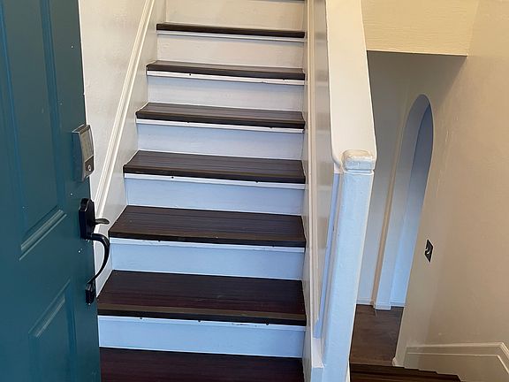 Stairs entrance to top and bottom floors