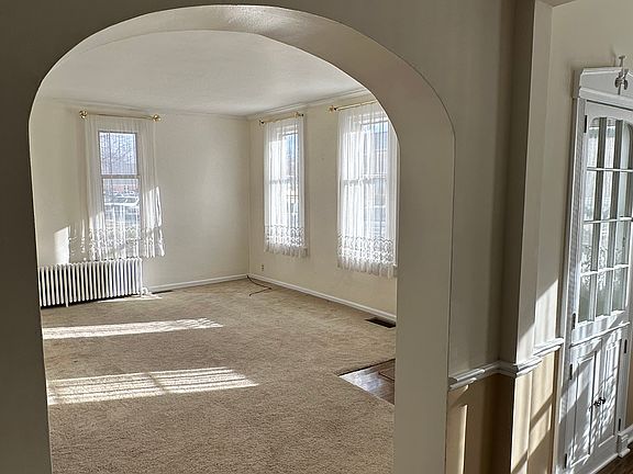 View into front room from dining room/kitchen