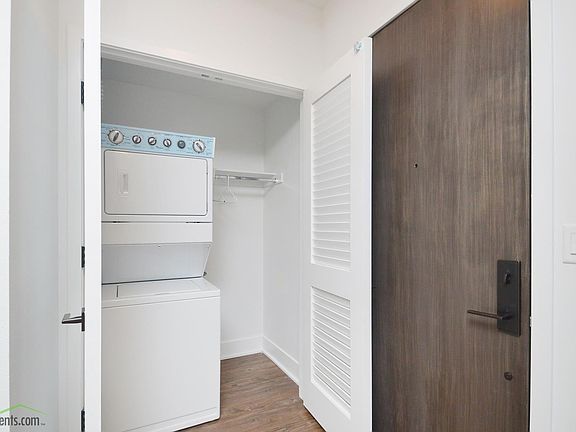 Washer and dryer included inside apartment.