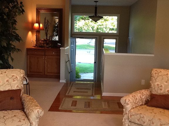 Entry with hardwood floor