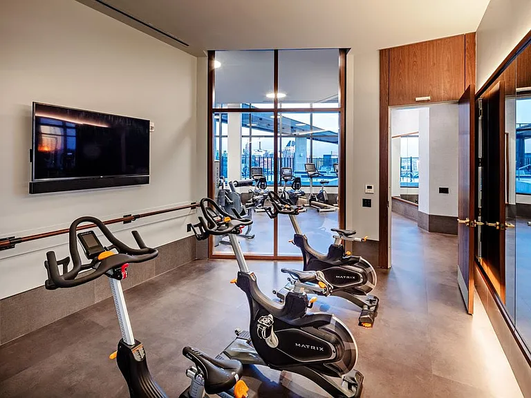 Fitness studio with spin bikes and virtual fitness programming
