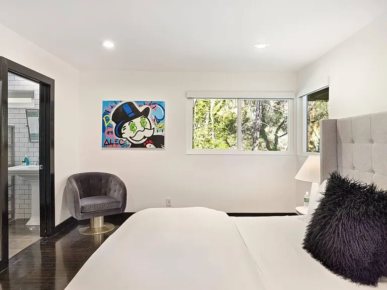 Experience comfort in our elegant bedroom, a tranquil haven where you can unwind and recharge.