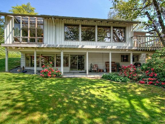 Nice sized lot offering privacy and lovely garden plantings.