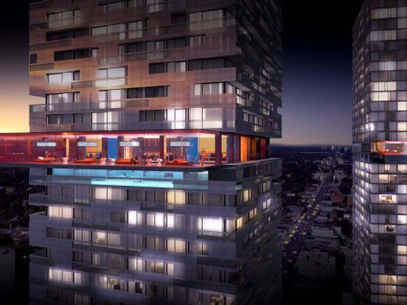 Swimming pool on the 25th floor overhanging the street below!