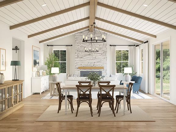 Dining area with vaulted shiplap ceilings and stained ceiling beams