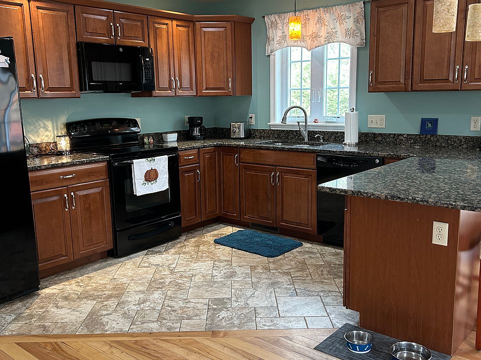 Kitchen with Cherry cabinets & granite counters