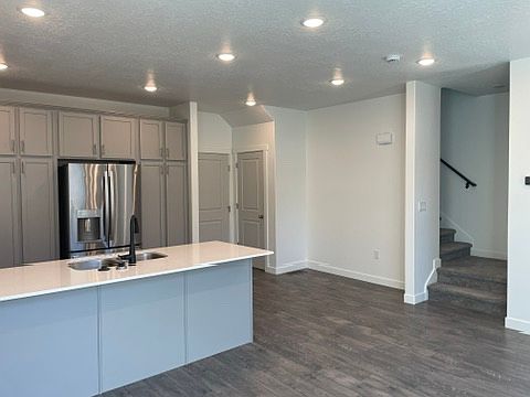 Kitchen and stairs to second floor.