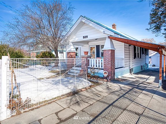Large carport can fit up to 3 cars