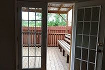 French doors lead to covered patio