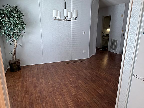 dining room with new light fixture
