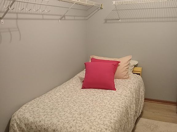 big walk in closet- able to put extra bed in it