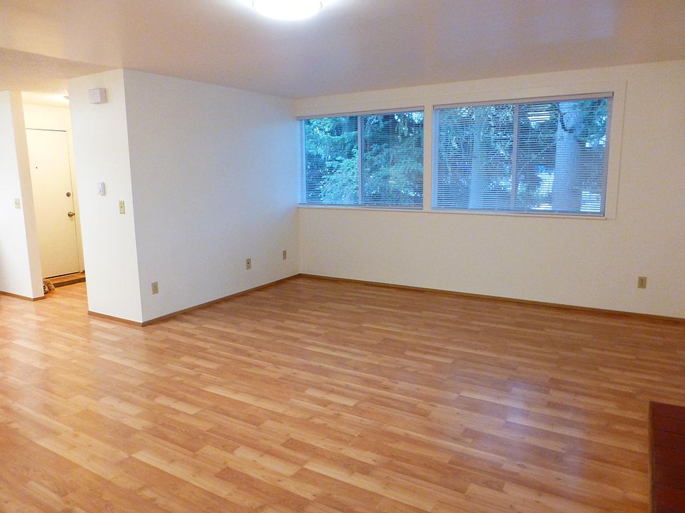 Entry with closet and sliding door to balcony off the spacious living room.