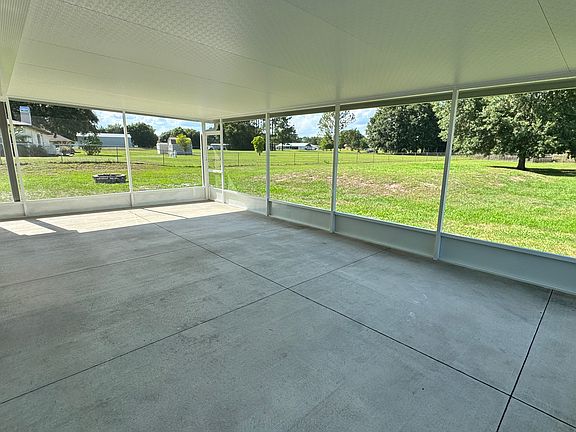 Screen enclosed patio view 1