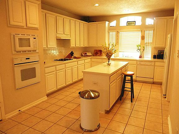 This Island kitchen has so much cabinet and counter space.