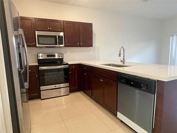 3rd image of 10492 W 34th Ct #10490