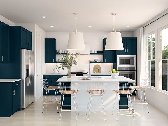 Kitchen with deep blue cabinets floating shelves